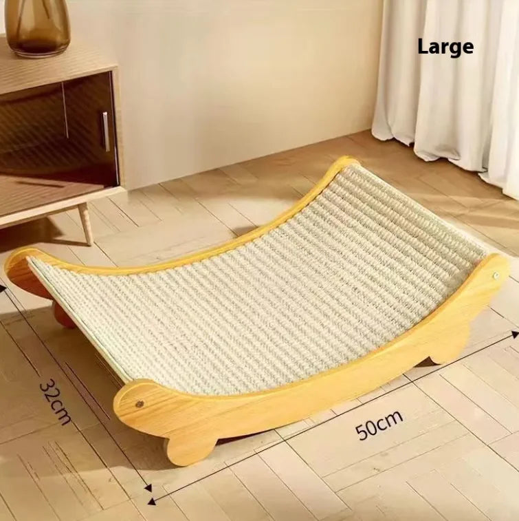 Curved wooden cat scratcher on a wooden floor with measurements indicated.